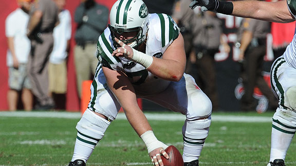 Center Nick Mangold of the New York Jets stands on the field during News  Photo - Getty Images