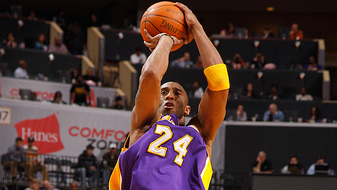 Guard Kobe Bryant of the Los Angeles Lakers stands with center News  Photo - Getty Images