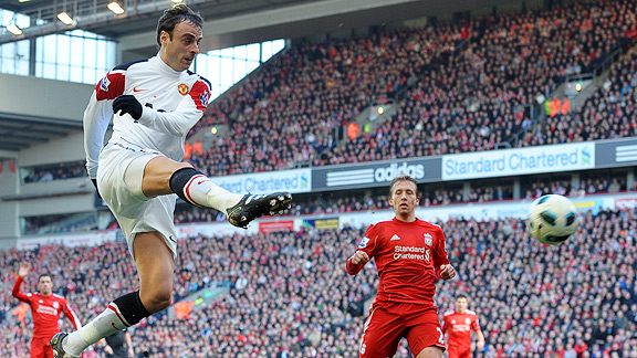 Manchester United's Dimitar Berbatov celebrates with Javier