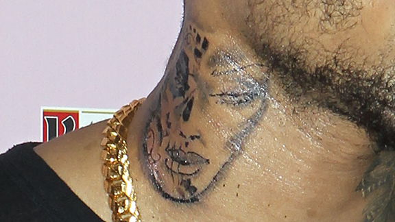 Chris Brown gets a huge face tattoo of an Air Jordan