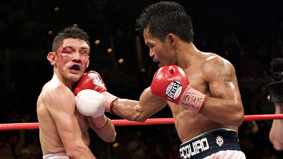 Manny Pacquiao stopped David Diaz in the ninth round to win the lightweight title in 2008.