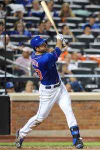 New York Mets' Anthony Recker, left, celebrates with Marlon Byrd