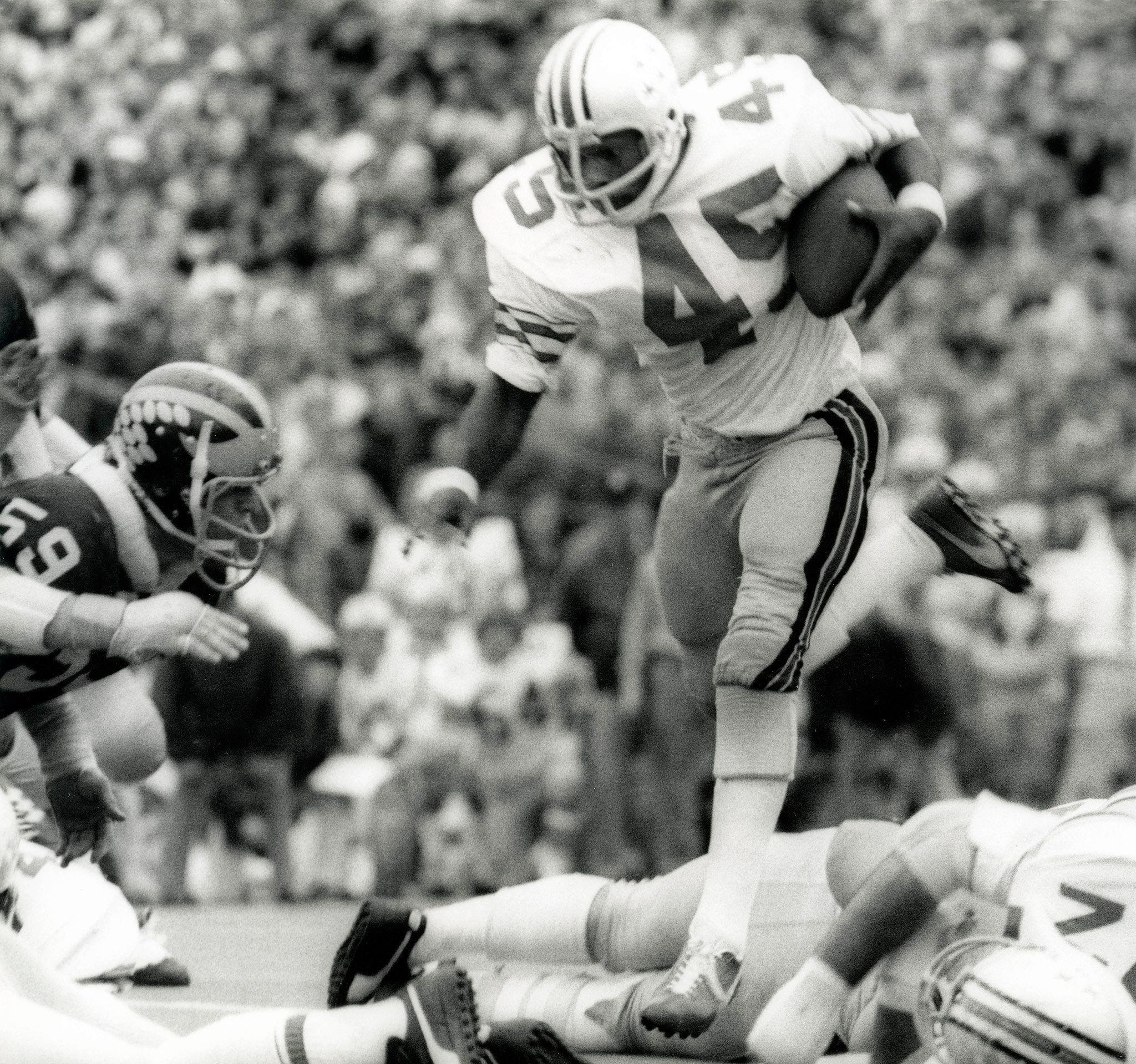 Archie Griffin rushing against Michigan.