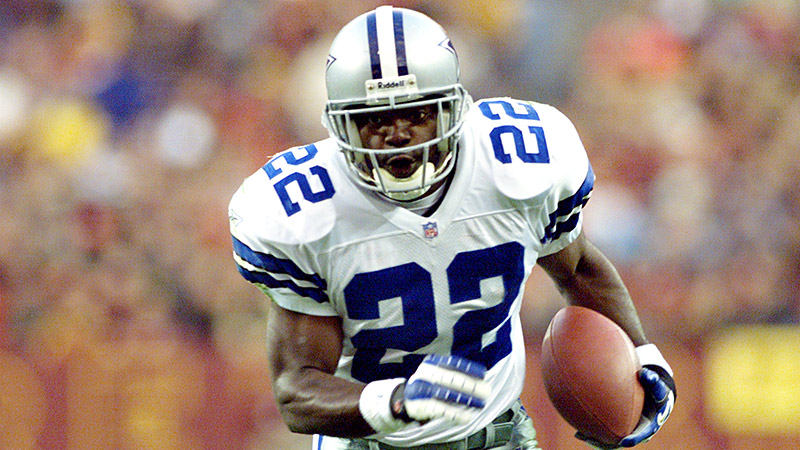 Emmitt Smith of the Dallas Cowboys carries the ball against the