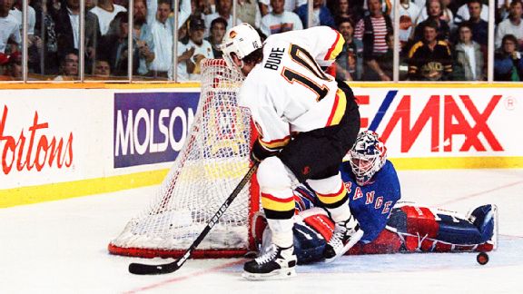New York Rangers goalie Mike Richter reaches to make a glove save on a shot  on goal by the Washington Capitals during third period action on Tuesday,  May 3, 1994 at Madison