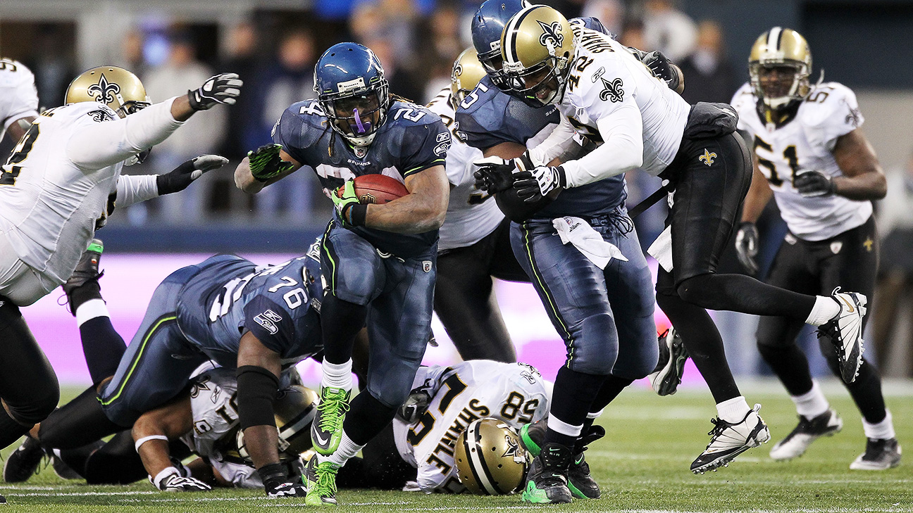 New Orleans Saints' Scott Shanle hits Seattle Seahawks' Mike