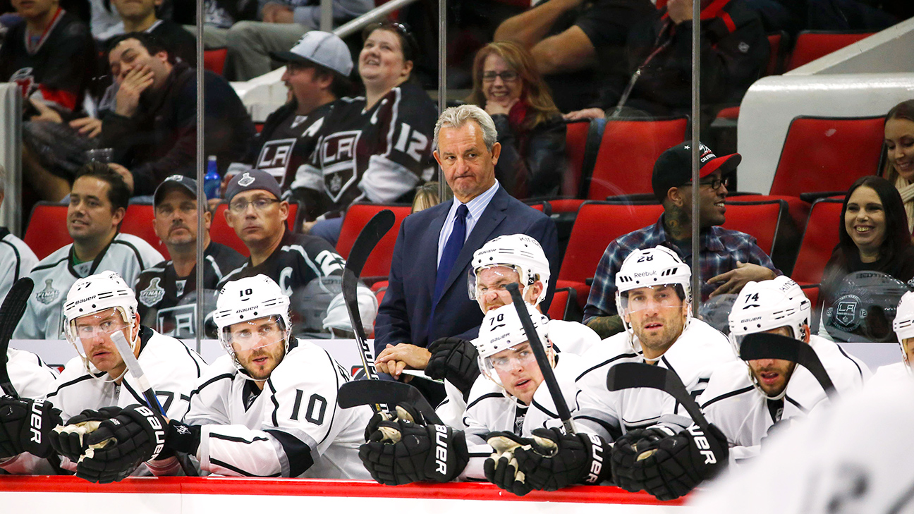 Anze Kopitar and Matt Greene of the Los Angeles Kings react after the