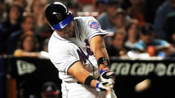 New York Mets' Dave Kingman takes a big swing at the ball during a