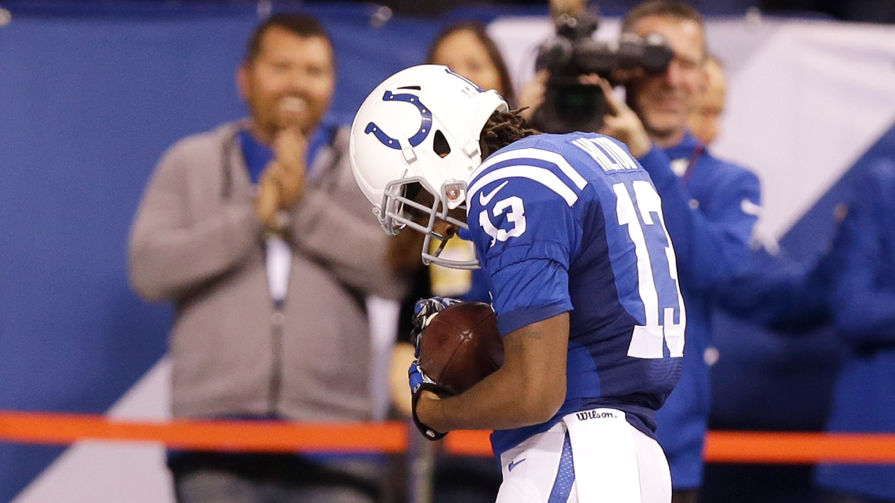 New dad T.Y. Hilton cradles ball like a newborn baby after