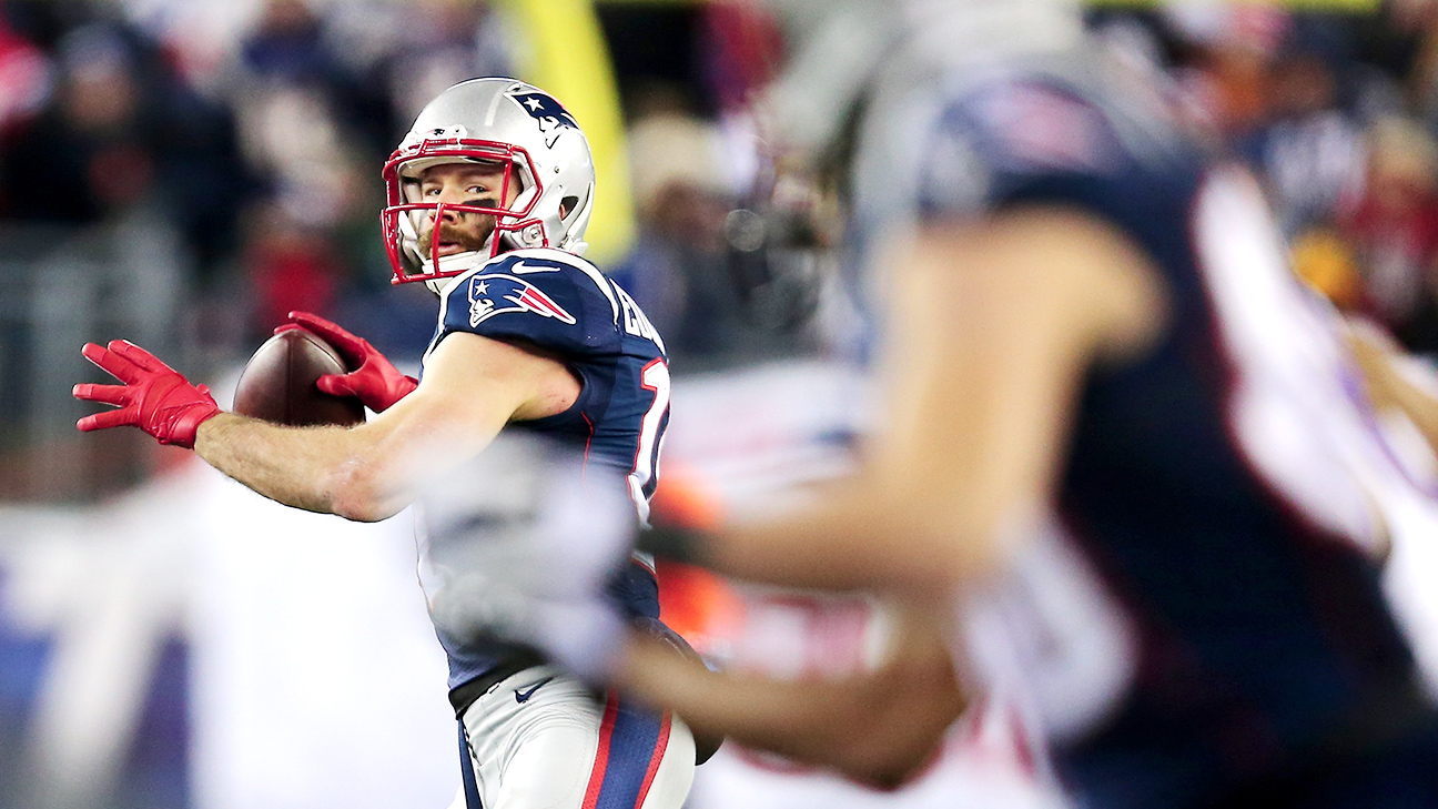 New England Patriots Julian Edelman runs after catching a pass