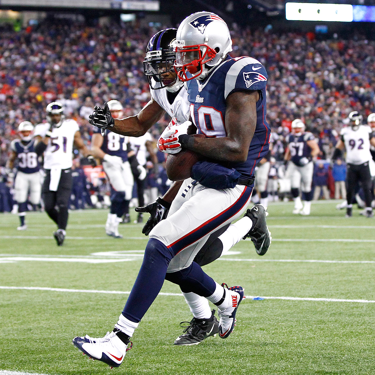 Patriots defeat Ravens at a wet Gillette Stadium