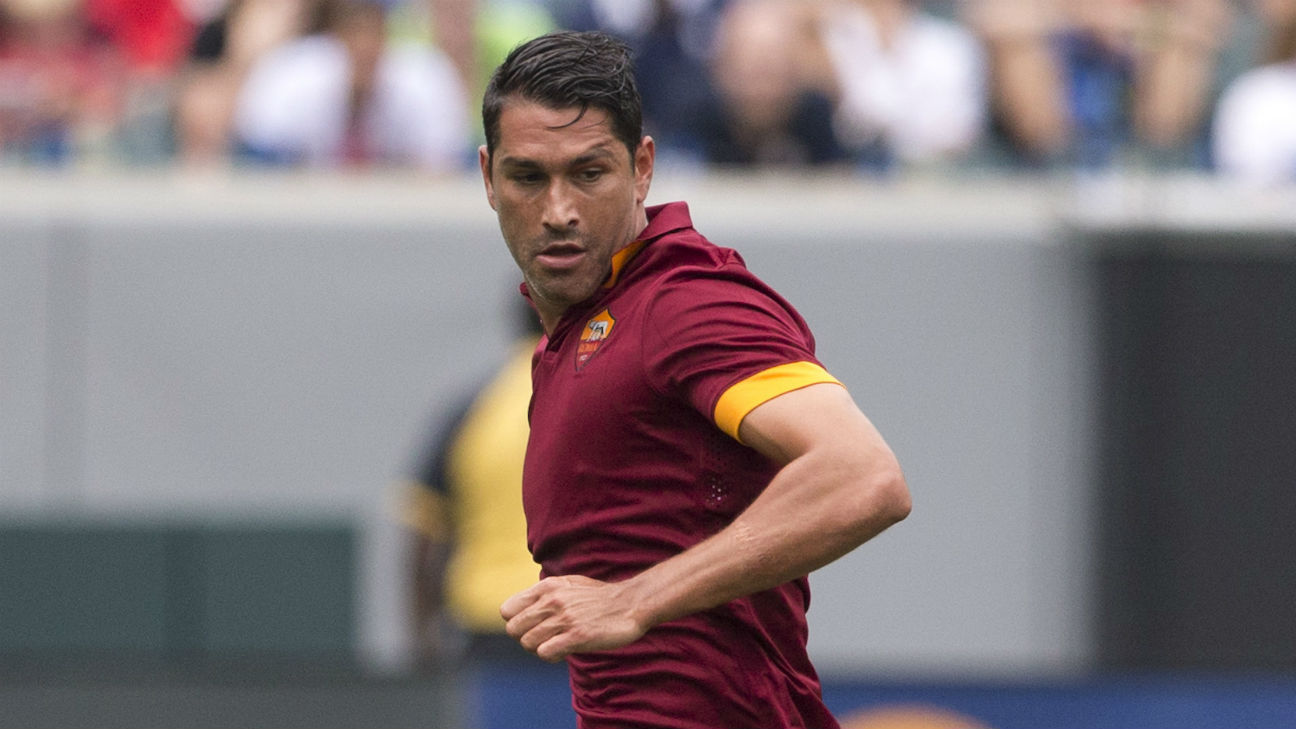 Roma sell Marco Borriello to Genoa acquire Nicolas Spolli on loan