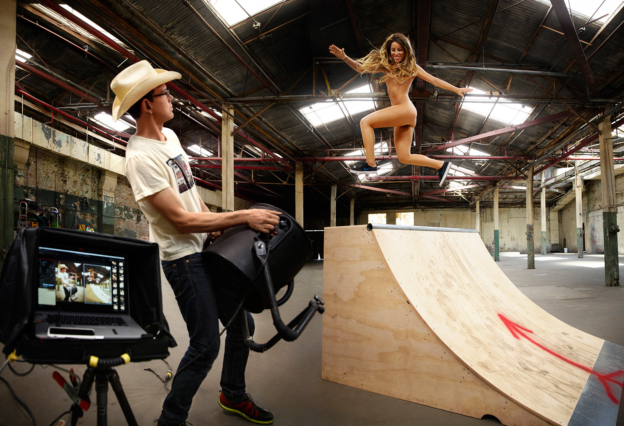Inside an L.A. warehouse, pro skateboarder Leticia Bufoni runs up a skate r...
