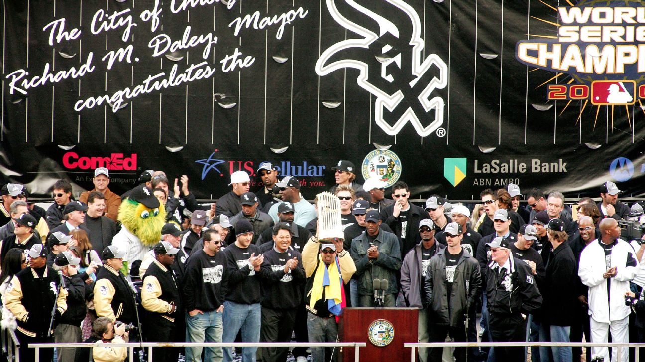 Baseball In Pics - Ozzie Guillen with the 2005 World Series trophy