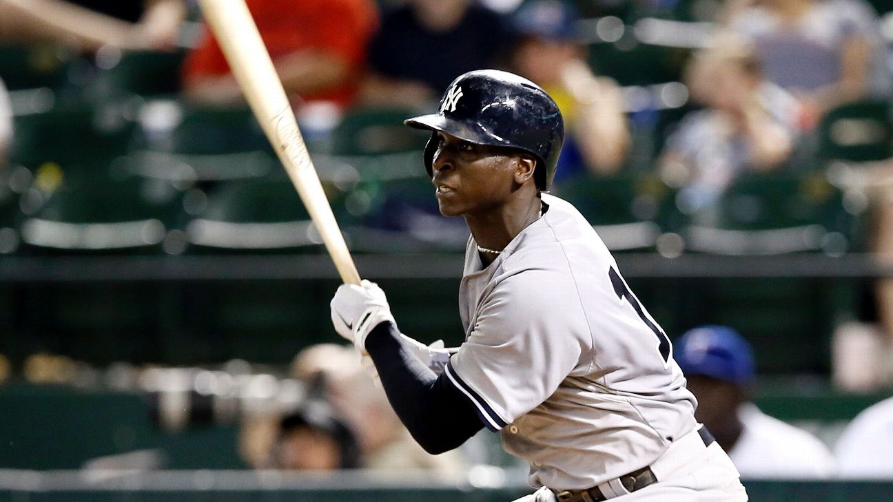 New York Yankees' Alex Rodriguez helps Didi Gregorius on defense