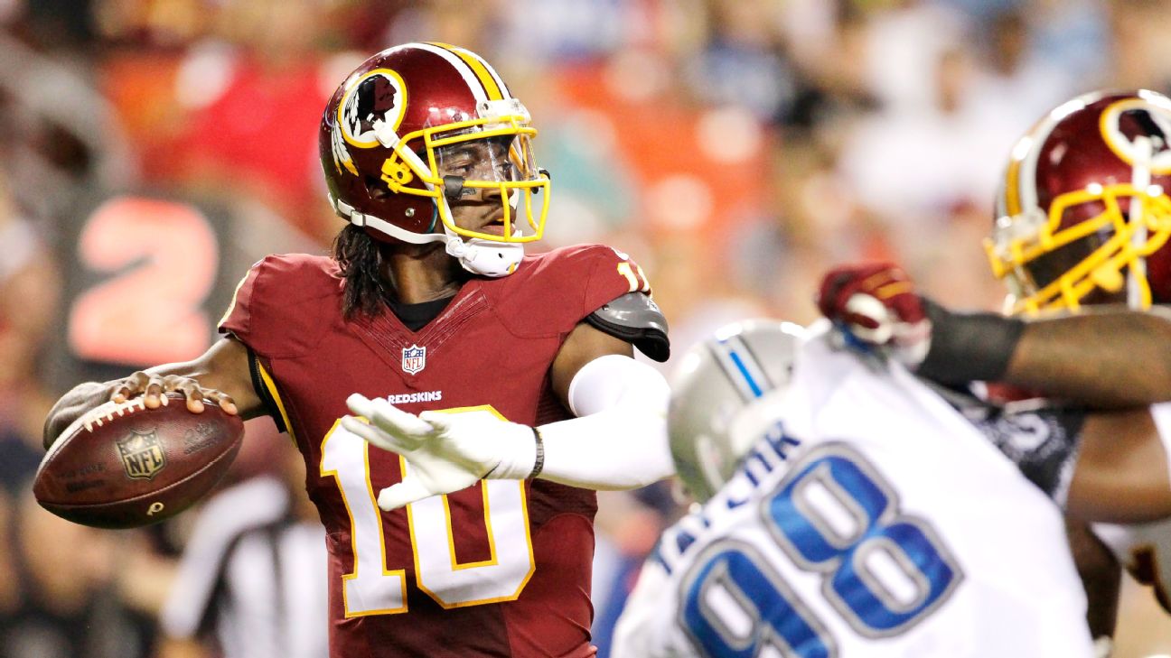 Washington Redskins quarterback Robert Griffin III (10) passes the ball  during the first half of an