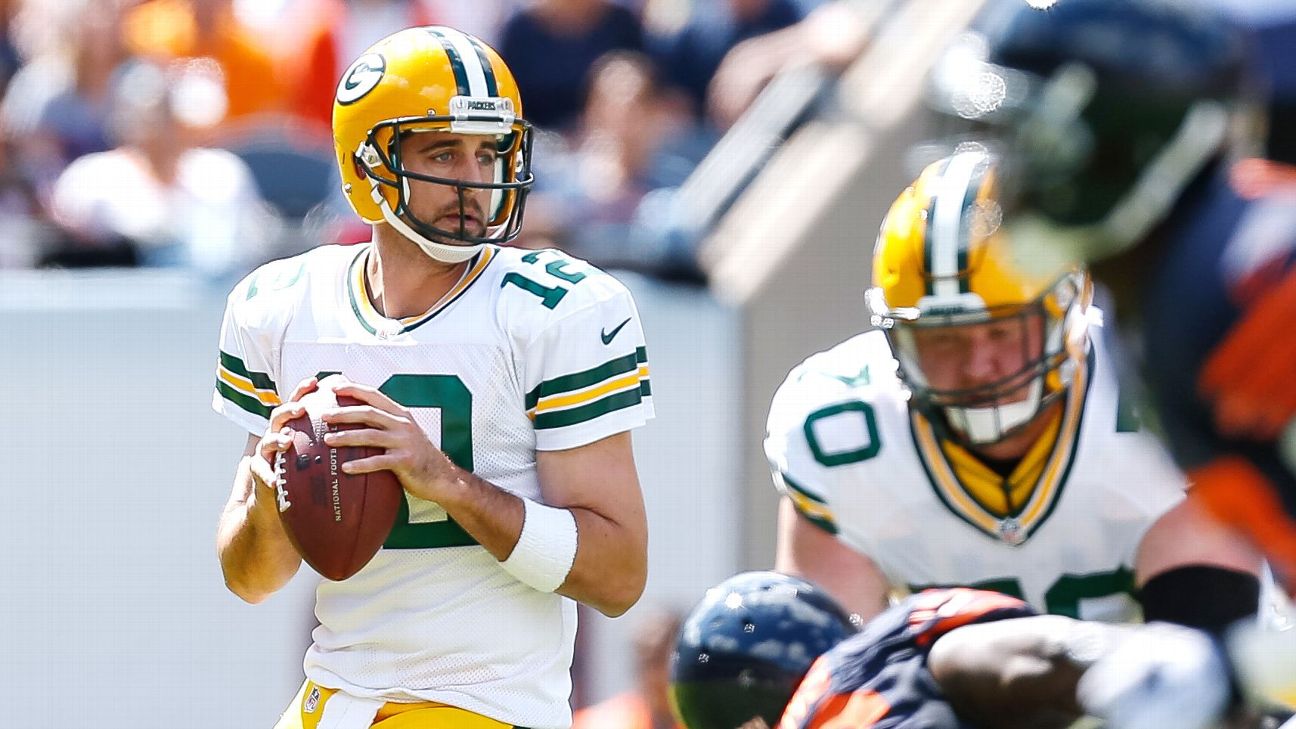 Green Bay Packers receiver Jordy Nelson (87) and quarterback Aaron Rodgers  (12) are all smiles after the two teamed up for a touchdown against the  Chicago Bears in the fourth quarter at