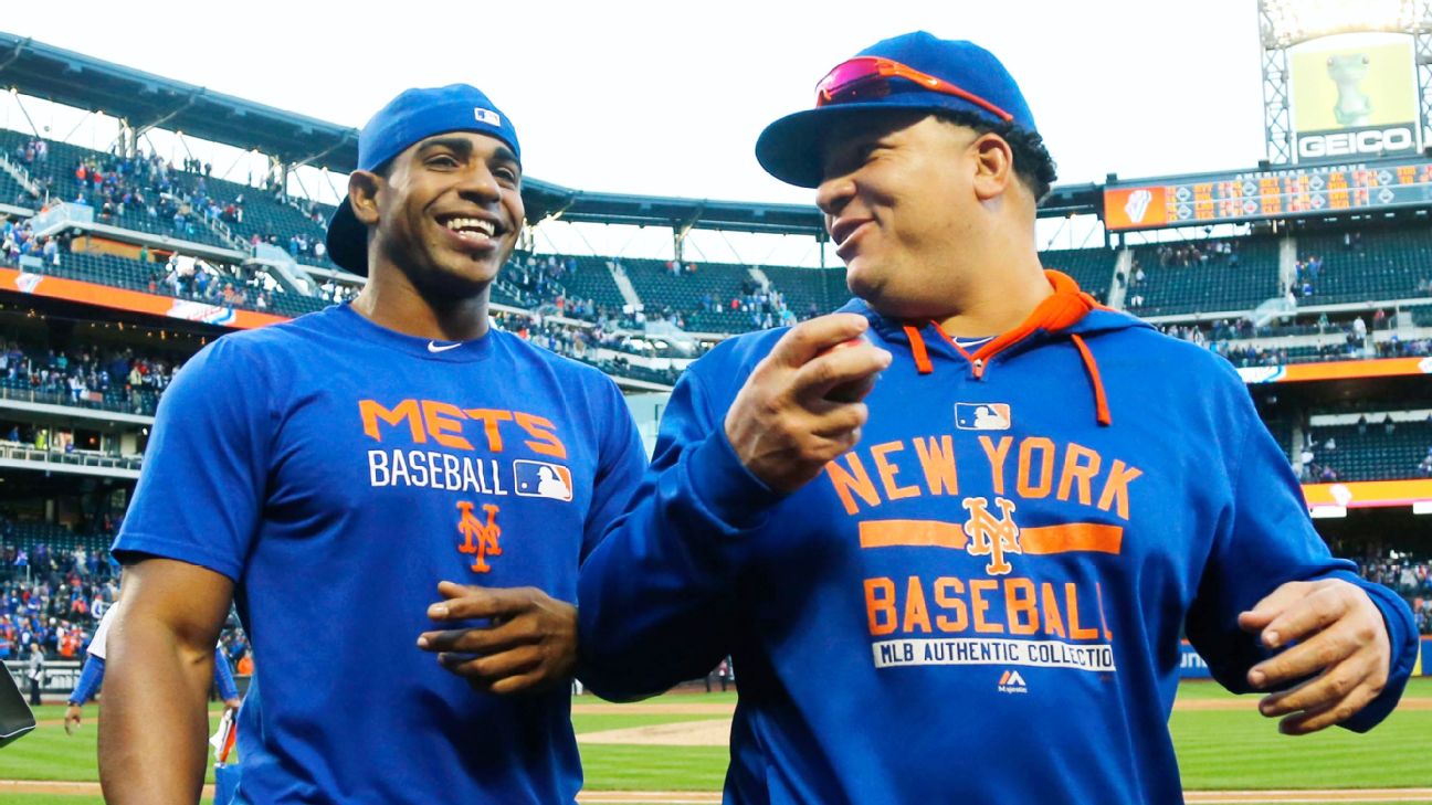 The Oakland Athletics' Yoenis Cespedes, right, is greeted at home