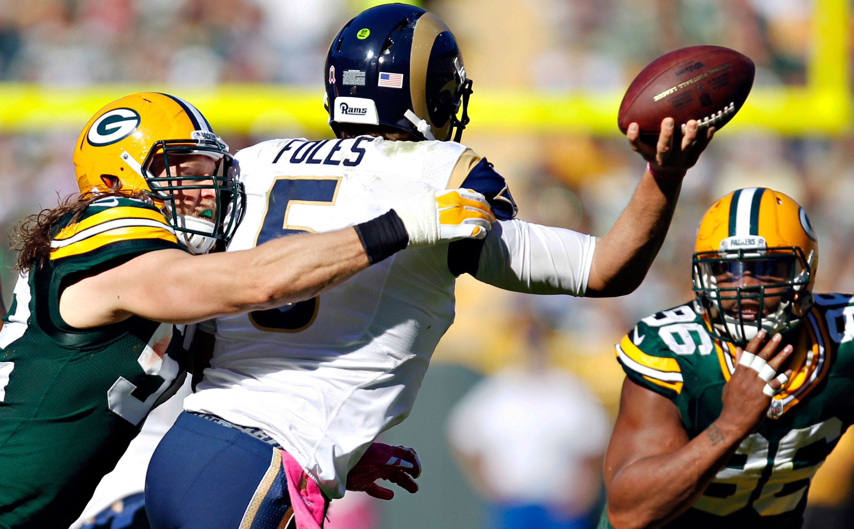 Clay Matthews and Nick Foles - Photos: Packers vs. Rams - ESPN