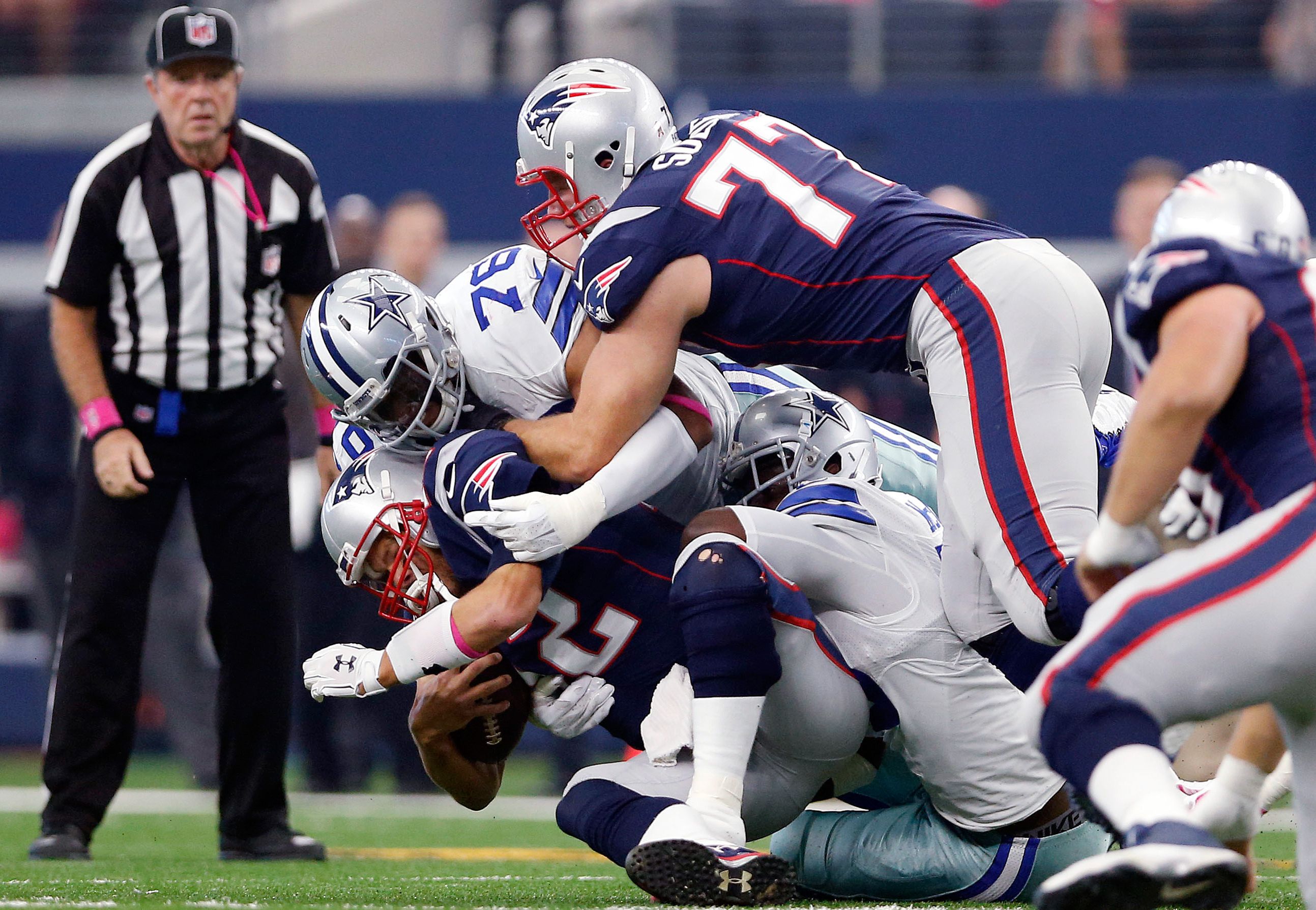 Greg Hardy and Rolando McClain take down Tom Brady - Photos: Cowboys vs ...