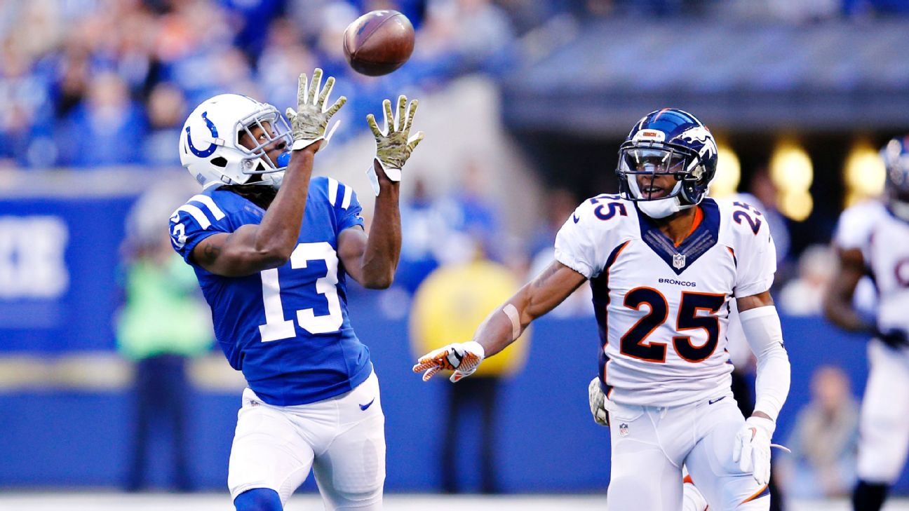 Indianapolis Colts wide receiver T.Y. Hilton (13) makes a touchdown catch  under pressure from R …