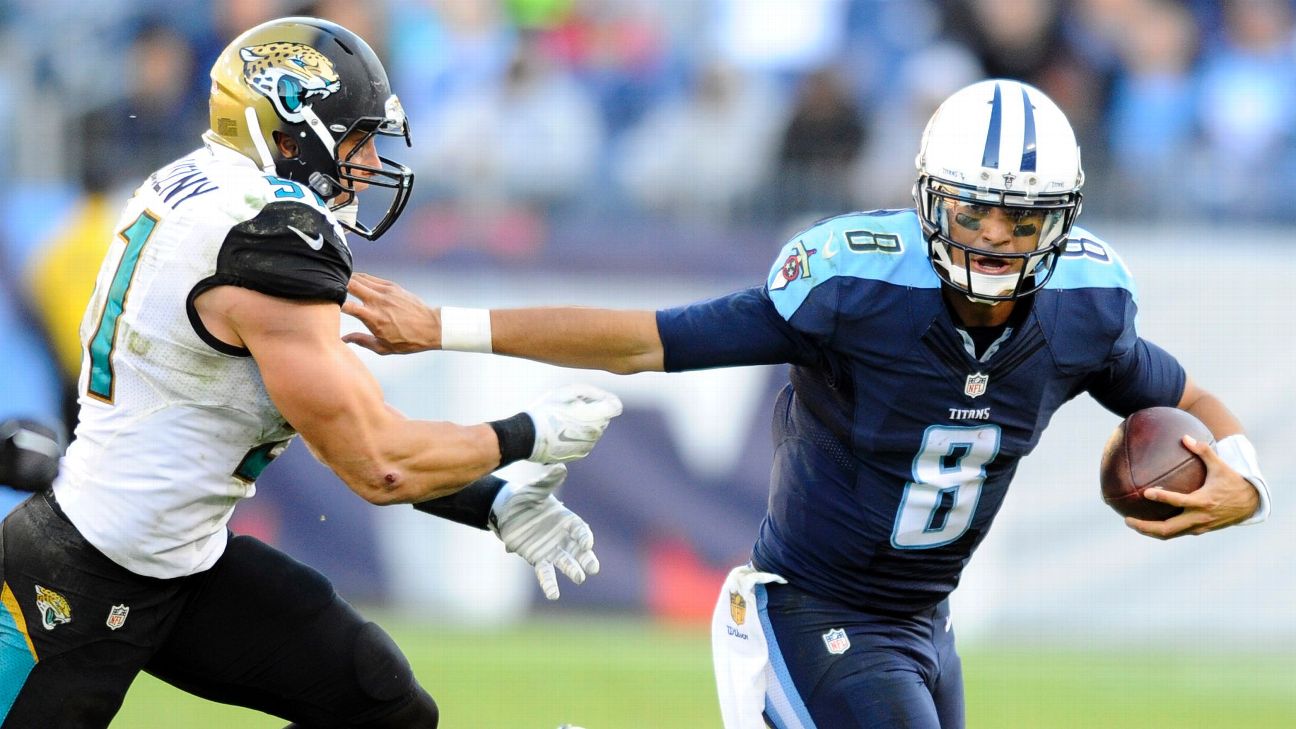 Raiders quarterback Marcus Mariota (8) dives for yardage against the  Indianapolis Colts in the …