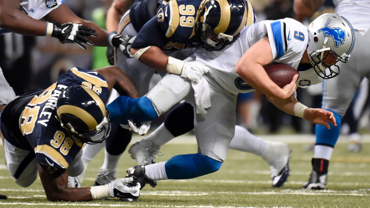 St. Louis Rams defensive tackle Aaron Donald, left, celebrates