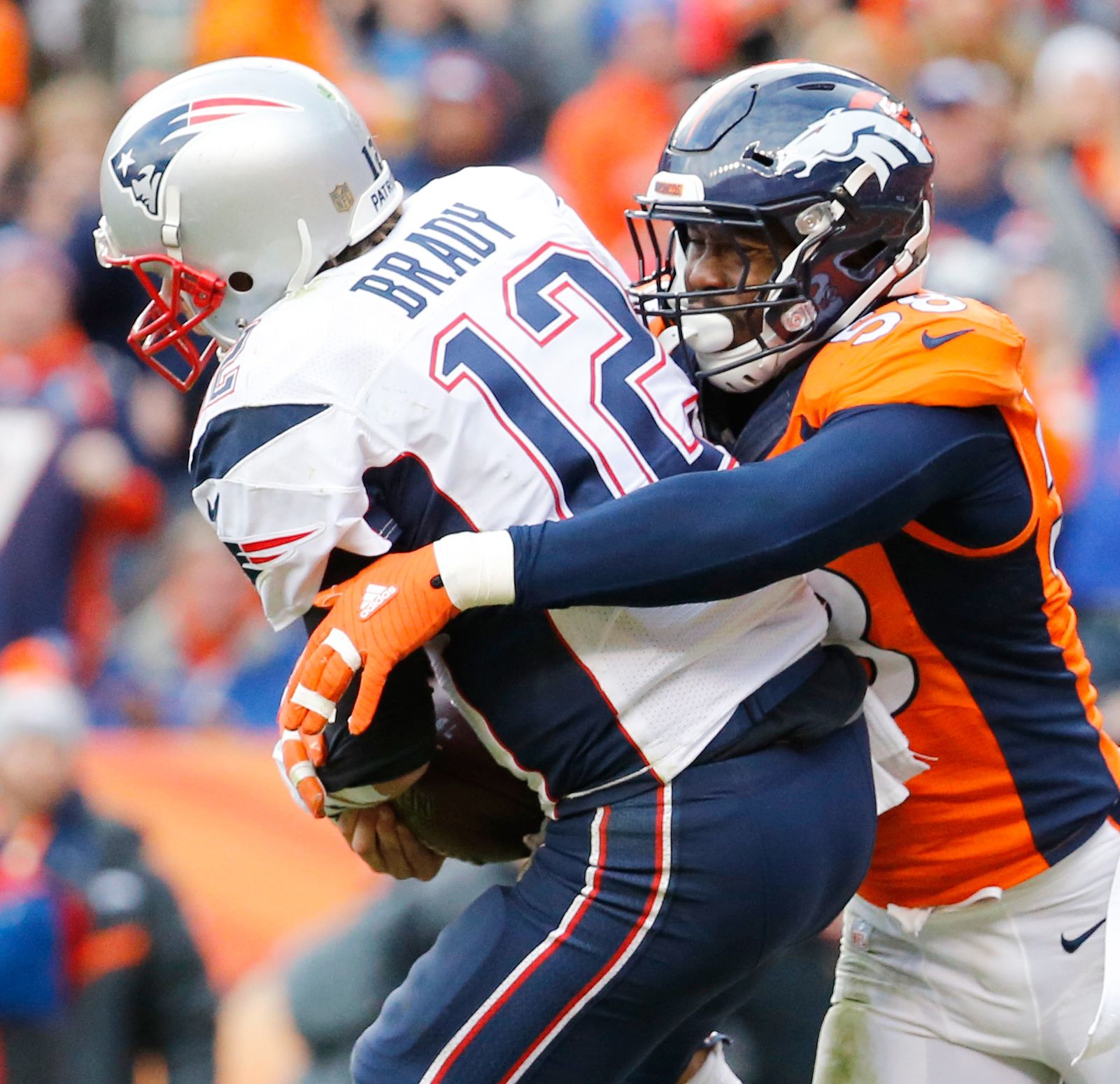 Von Miller sacks Tom Brady Photos Patriots vs. Broncos in AFC