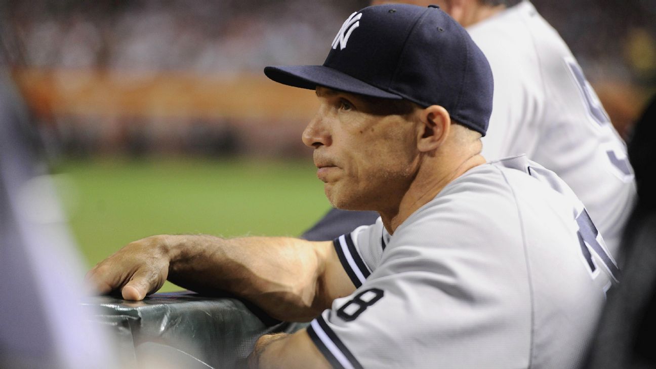 New York Yankees manager JOE GIRARDI takes the ball from BRYAN MITCHELL