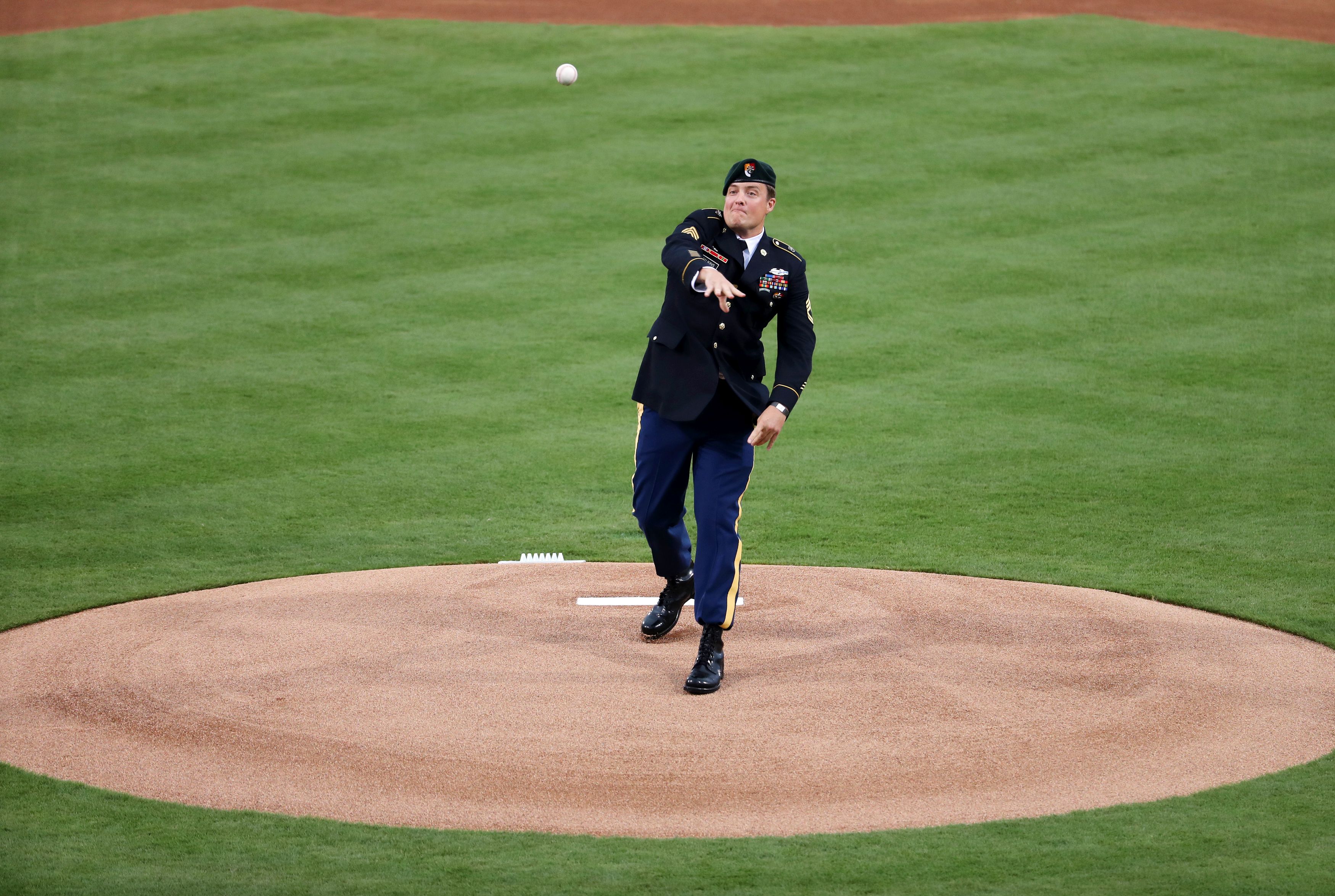 First Pitch Photos Marlins vs. Braves at Ft. Bragg ESPN