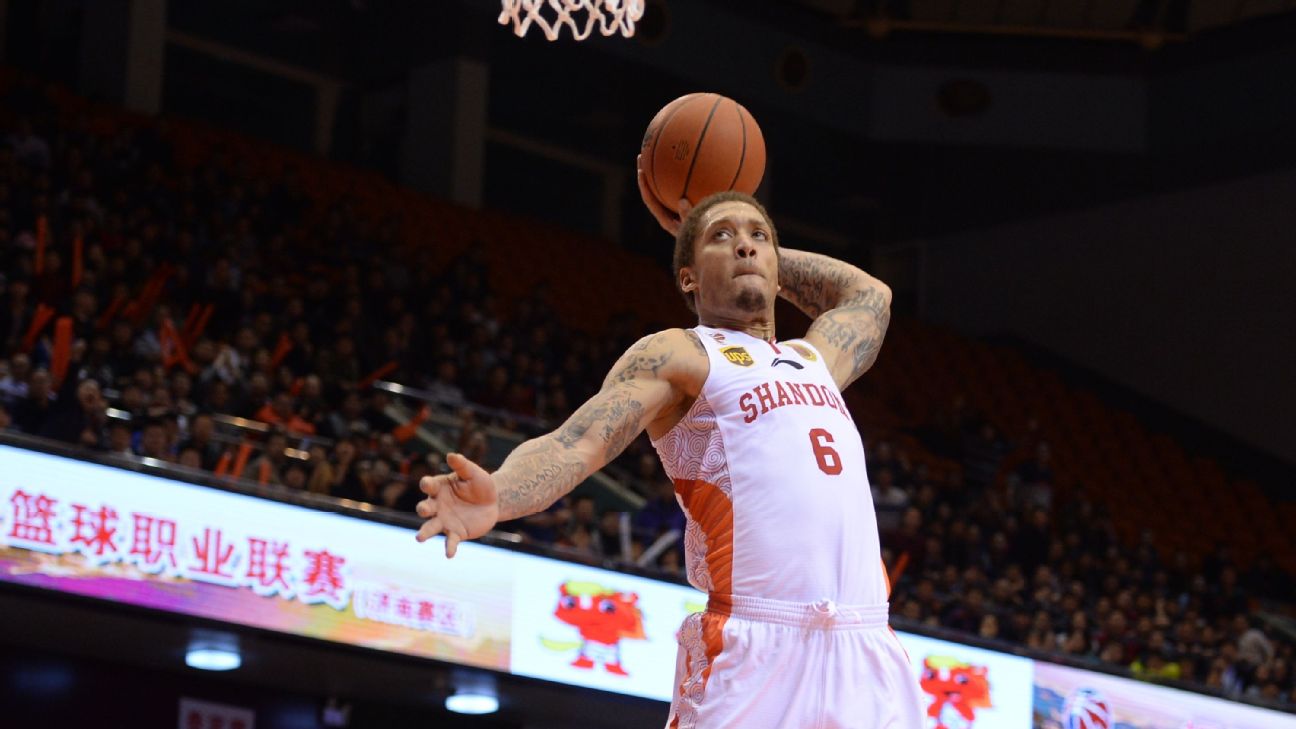 Michael Beasley goes up for a dunk for the Shanghai Sharks