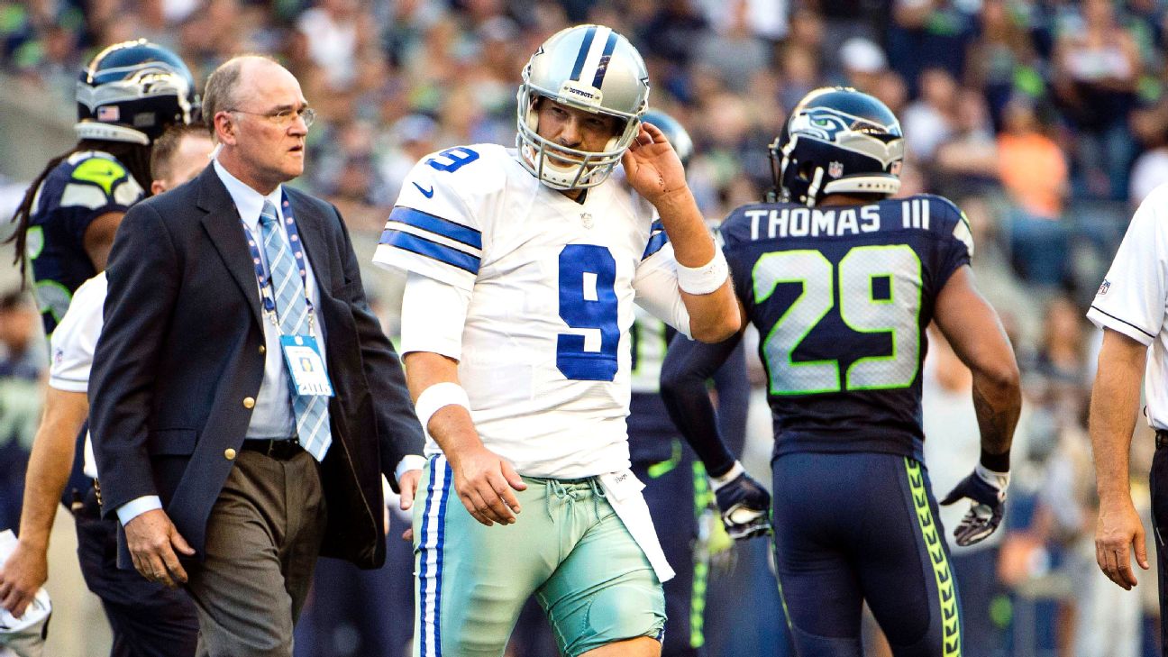 Dallas Cowboys quarterback Tony Romo (9) puts his hand to his face