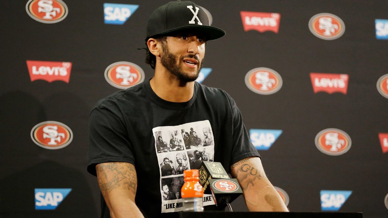 Colin Kaepernick of San Francisco 49ers sits during national anthem prior  to preseason game - ESPN