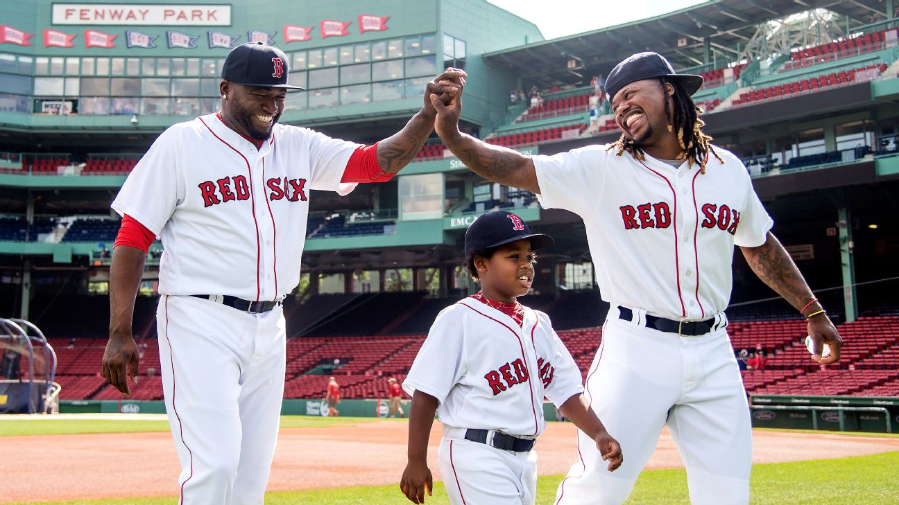 Red Sox DAVID ORTIZ(BIG PAPI) embraces Mookie Betts