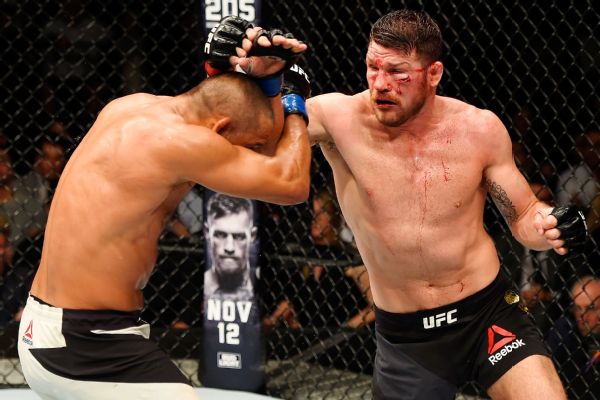 Michael Bisping outpoints retiring Dan Henderson to defend UFC title ...