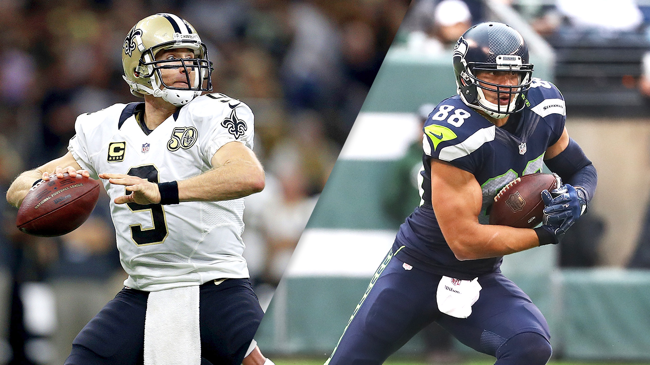 Jimmy Graham of the Seattle Seahawks watches from the sideline during