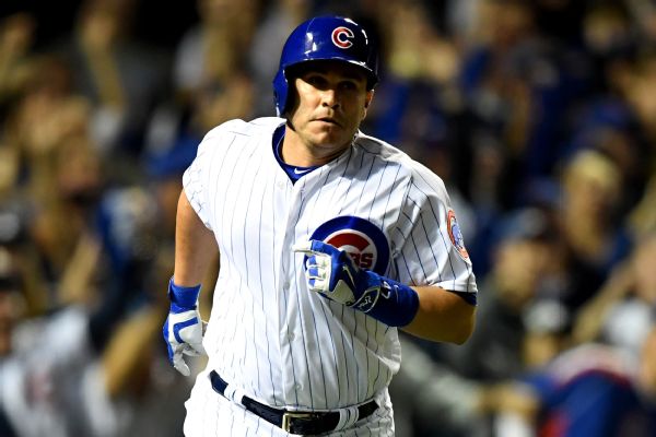 Cubs catcher Willson Contreras with the World Series trophy - ABC7 Chicago