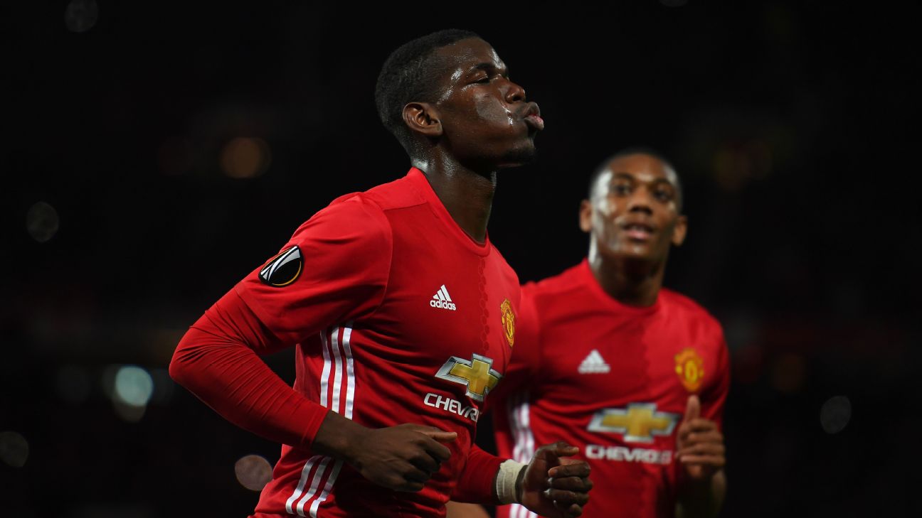 Manchester United's Paul Pogba pulls up is shirt during their English  Premier League soccer match between Manchester United and Crystal Palace at  Old Trafford in Manchester, England Saturday, Aug., 24, 2019. (AP