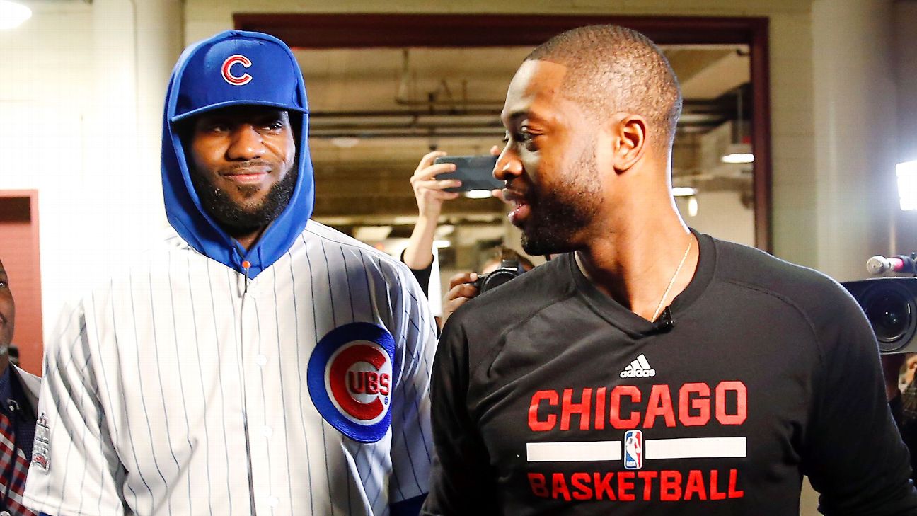 Cleveland Cavaliers' LeBron James wears Chicago Cubs uniform to