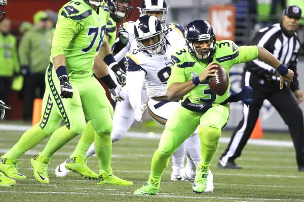 Seahawks QB Russell Wilson limited with right pectoral muscle