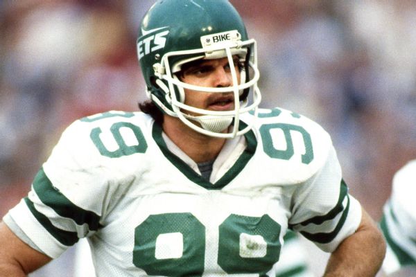 Defensive end Mark Gastineau of the New York Jets looks on against