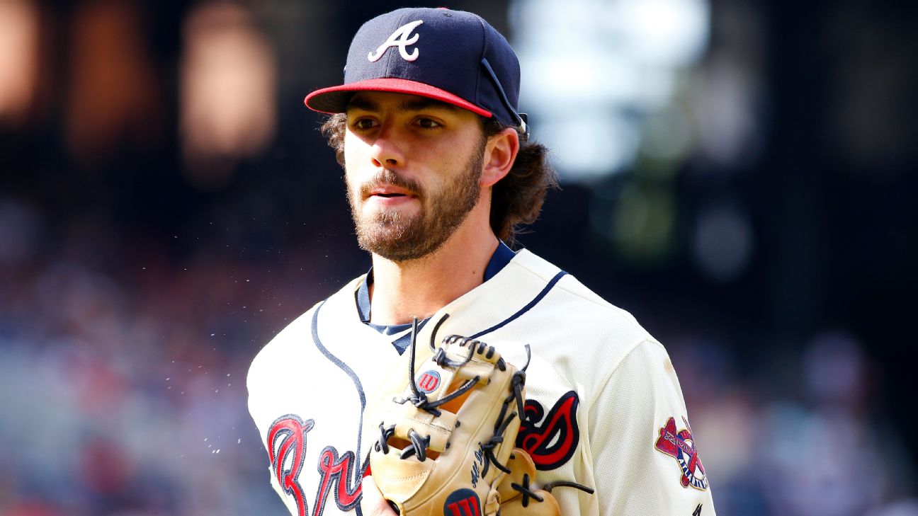 Atlanta Braves News Now - Why does Dansby #Swanson wear his glove on his  head?