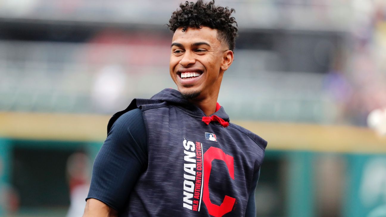 Cleveland Indians shortstop Francisco Lindor, uses his teeth to