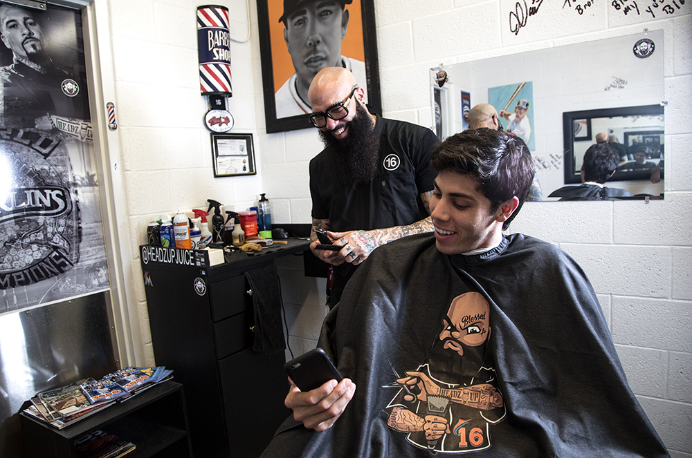 Miami Headz Up barber Hugo Juice Tandron styles the Marlins