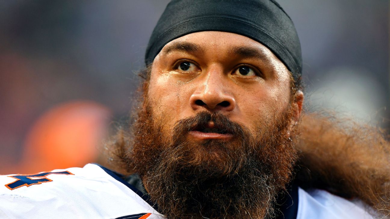 Denver Broncos nose tackle Domata Peko (94) calls for crowd