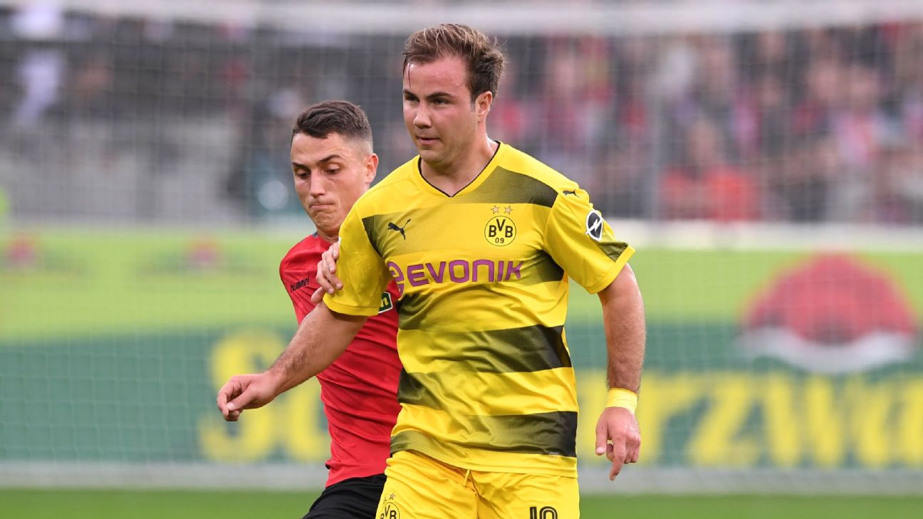 Borussia Dortmund win 4-2 at Freiburg in crazy game - anews