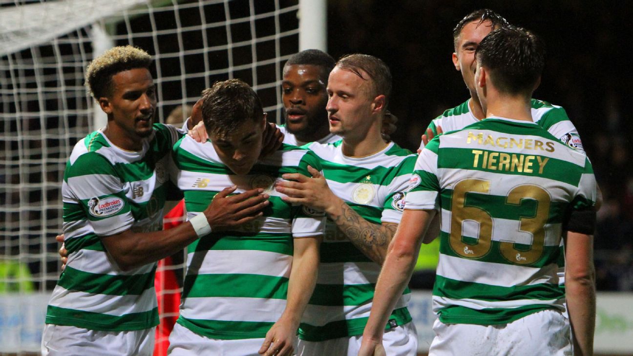 Dejected Celtic players Patrick Roberts, Scott Brown, Kieran