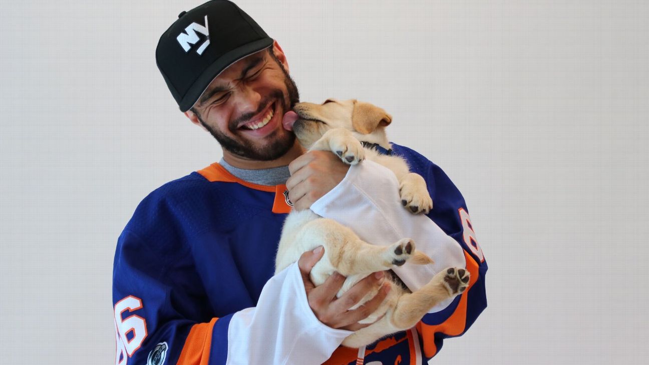 Islanders Pucks and Paws calendar shoot is too adorable for words