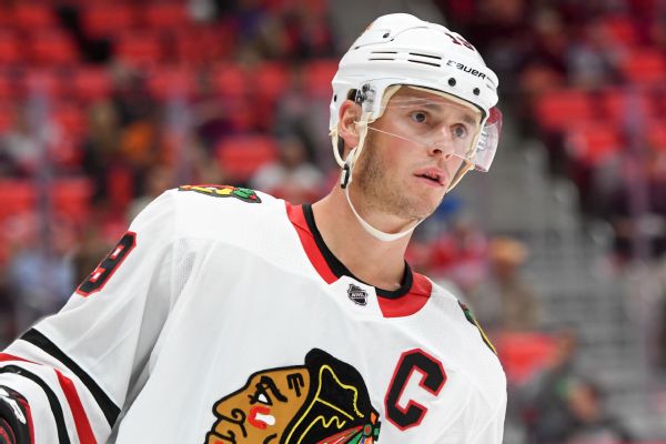 Jonathan Toews out with upper-body injury, will be re-evaluated nex ...