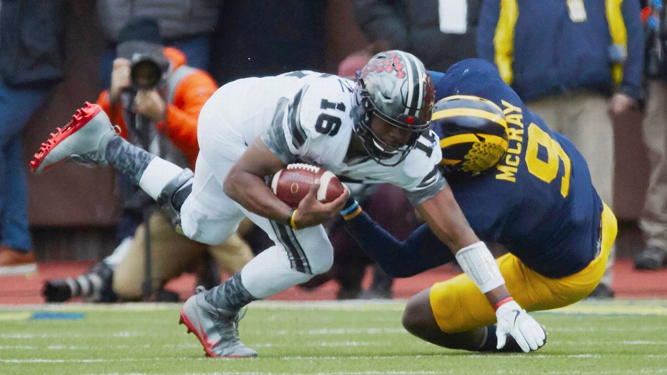 J.T. Barrett injury: Ohio State QB suffers right ankle fracture, carted off  against Michigan - Sports Illustrated